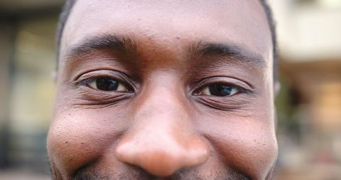 Close-Up Portrait of a Man with Stubble Outdoors