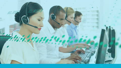 Team of Customer Service Representatives Using Headsets