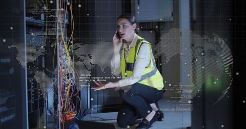 Technician troubleshooting cables in server room with digital overlays