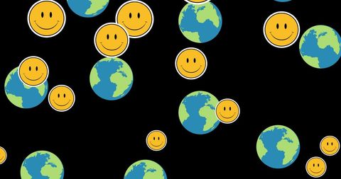 Smiley face emoticons and globes on black background
