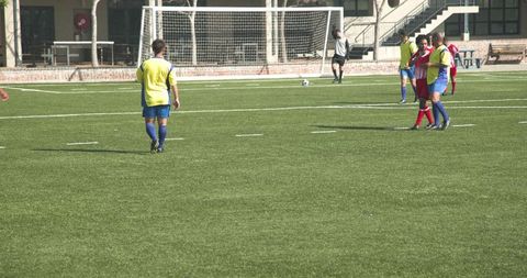 Intense Soccer Match on Modern Soccer Field