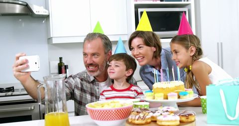 Family Celebrating Birthday Party with Selfie - Download Free Stock Images Pikwizard.com