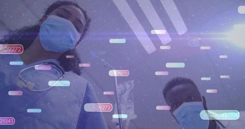 Leaning clinicians peering over camera with augmented reality patient data overlay in hospital ward