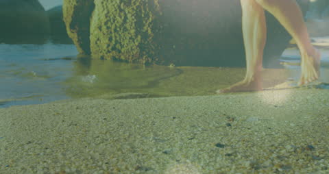 Barefoot Walk on Sandy Beach with Gentle Waves