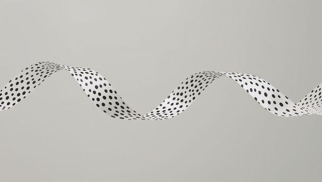 Curving polka-dot ribbon twisting across neutral backdrop minimalist wave