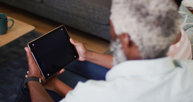 Senior Man Using Tablet at Home - Download Free Stock Images Pikwizard.com