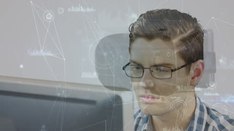 Technology Innovator Analyzing Data Networks in Modern Office