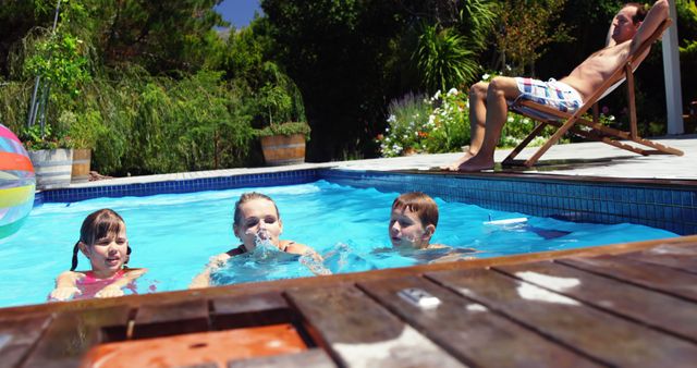 Children Enjoying Summer Fun in Outdoor Pool with Relaxed Parent - Download Free Stock Images Pikwizard.com