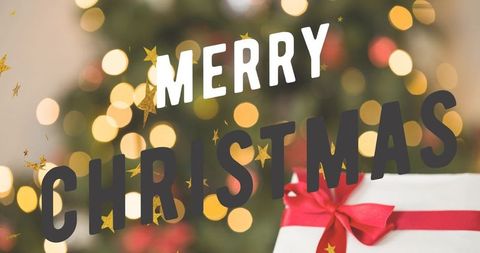 Merry christmas text over wrapped gift with red ribbon and bokeh tree lights background