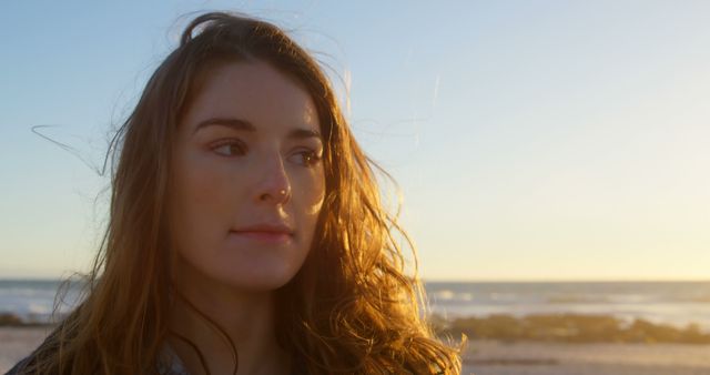 Thoughtful Woman at Beach During Golden Hour - Download Free Stock Images Pikwizard.com