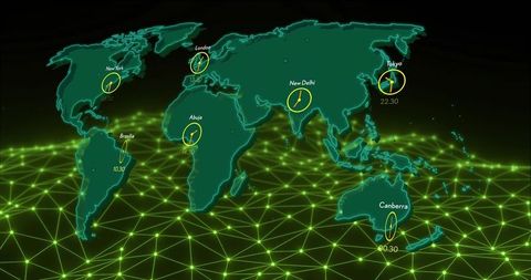 Futuristic neon world map hovering over virtual network grid showing glowing clocks