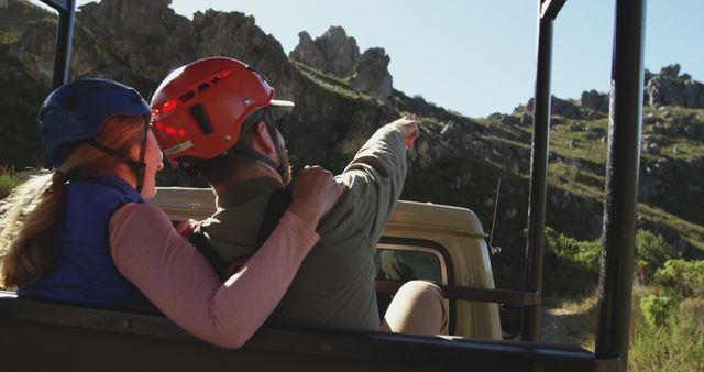 Adventurous Couple Enjoy Safari Exploring Rocky Terrain - Download Free Stock Images Pikwizard.com