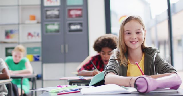 Happy students studying in a diverse and modern classroom - Download Free Stock Images Pikwizard.com