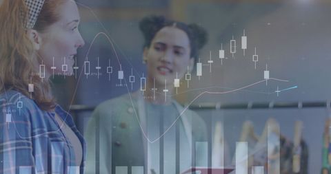 Creative Female Fashion Designers Analyzing Data Trends