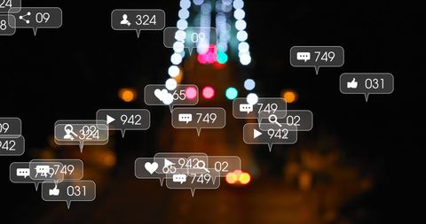 Social Media Engagement Icons Over City Lights