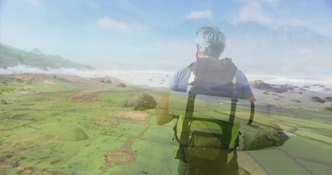 Hiker overlooking lush coastline: adventure and serenity