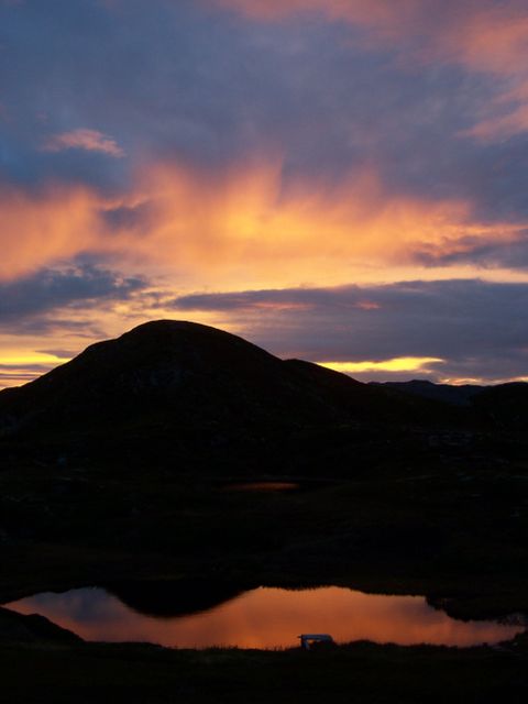 Stunning Mountain Silhouette at Sunset with Reflecting Lake - Download Free Stock Photos Pikwizard.com