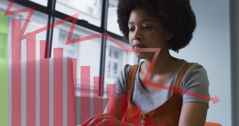 Businesswoman Analyzing Data with Digital Graph Overlay