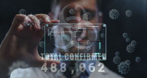 Doctor Holds Futuristic Screen Displaying COVID-19 Stats with Virus Cells - Download Free Stock Images Pikwizard.com