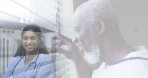 Senior Patient Smiling in Hospital Window Reflection with Caring Doctor