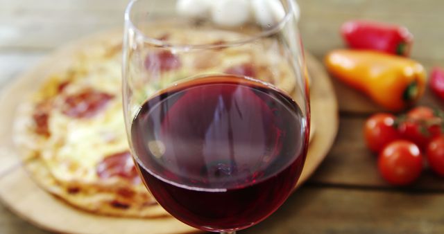 Glass of Red Wine with Pizza on Rustic Table - Download Free Stock Images Pikwizard.com