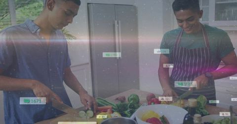 Two men slicing fresh vegetables in home kitchen, social media metrics overlay
