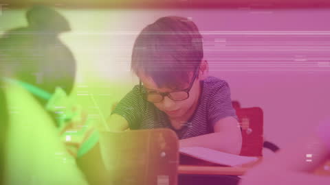 Boy in Class Surrounded by Digital Animation Effects