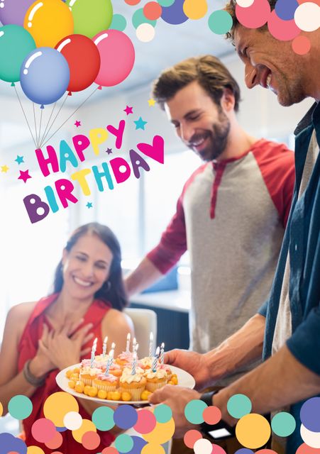 This visual shows a joyful birthday celebration, perfect for festive greeting cards, birthday invitations, or party decoration ideas. The image captures the excitement and happiness of the occasion with friends presenting a cake and colorful background designs of balloons, making it suitable for promoting catering services, event planning, or social media posts related to birthdays.