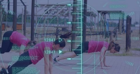 Women Exercising on Obstacle Course with Digital Interface Overlay