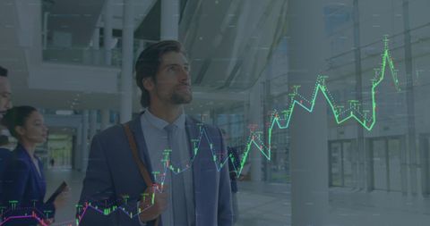 Businessman Analyzing Financial Data in Modern Airport