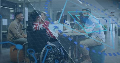 Inclusive team collaborating with wheelchair user and ar hud visualizing data