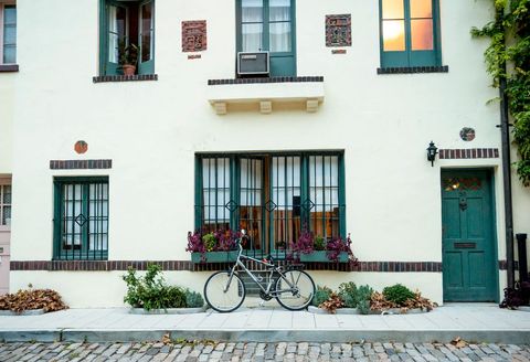 Vintage Bicycle Resting on Tranquil Suburban Street