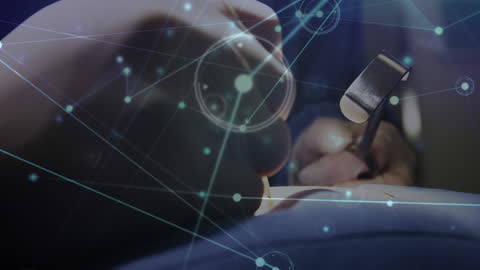 Surgeons Operating With Digital Network Overlay
