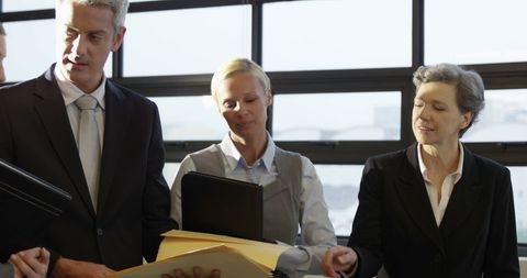 Business Professionals Collaborating in Corporate Setting - Download Free Stock Images Pikwizard.com
