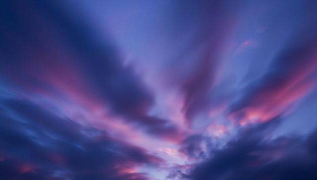 Majestic dusk sky with purple and pink clouds