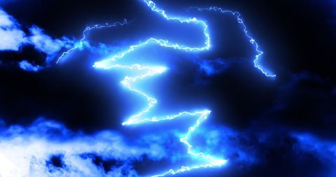 Blue Lightning Bolts Illuminate Dark Sky Creating Dramatic Scene