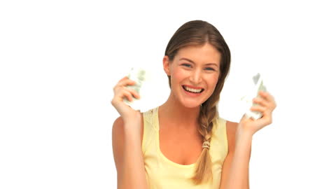 Joyful Woman Displaying Cash with Enthusiastic Smile