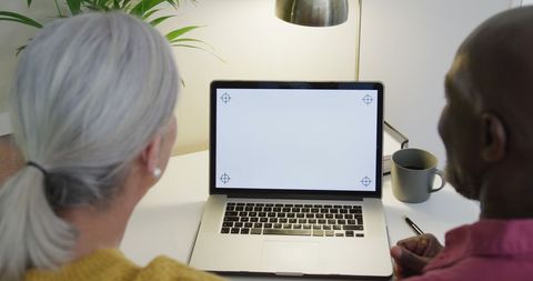 Senior Couple Using Laptop at Home Office Desk - Download Free Stock Images Pikwizard.com