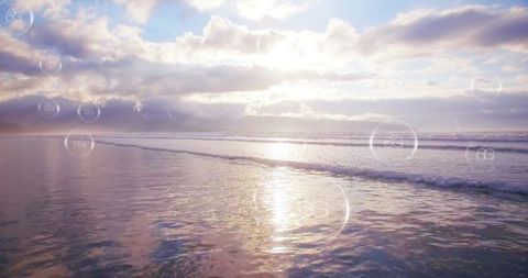 Golden Sunrise Over Ocean with Futuristic Digital Overlays