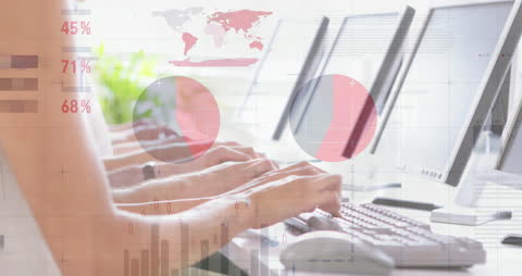 Team Analyzing Stock Data on Computers in Modern Office