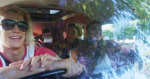 Group of Young Adults Embracing Adventure on Road Trip - Download Free Stock Images Pikwizard.com
