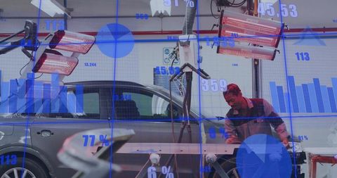 Technician repairing hatchback panel with ar analytics overlay visualizing production data