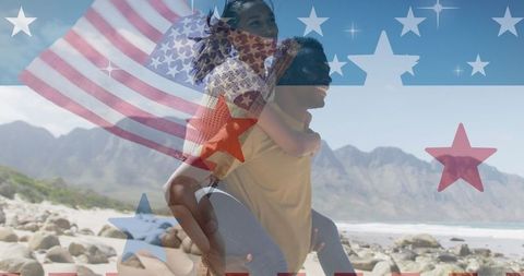 Patriotic Couple Celebrating in Scenic Mountain Landscape