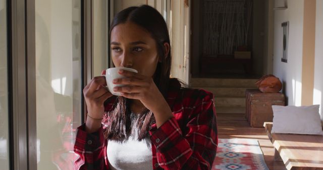 Woman Drinking Coffee by Window in Bright Sunny Morning - Download Free Stock Images Pikwizard.com