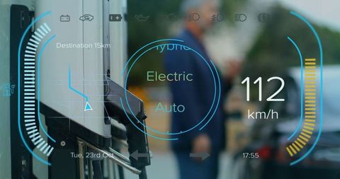 Futuristic interface with electric charging and speedometer over petrol station