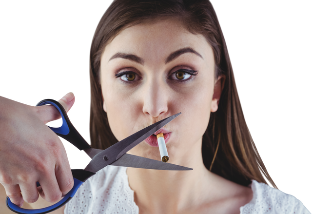 Woman cutting cigarette with scissors symbolizing quitting smoking - Download Free Stock Videos Pikwizard.com