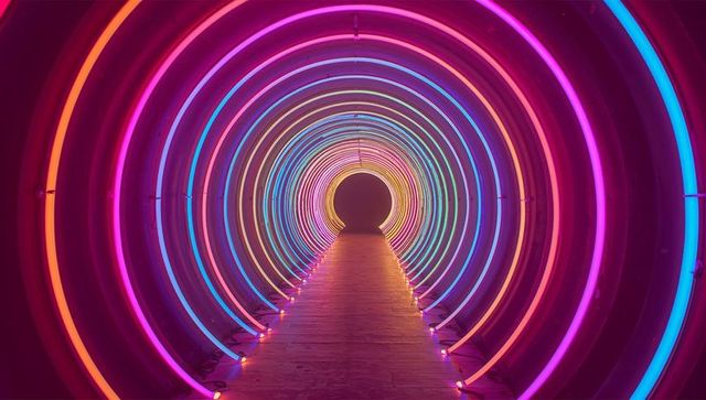 Futuristic neon tunnel with vibrant led light rings