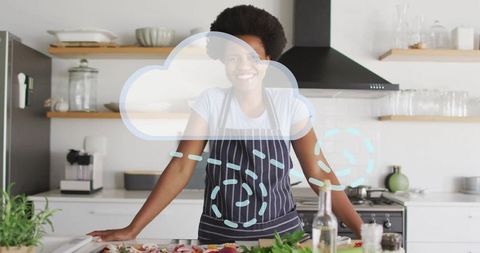 Joyful Woman Preparing Fresh Meal in Modern Kitchen