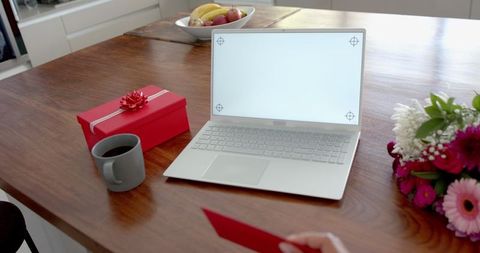 Celebrating Virtual Occasions with Laptop Gifts and Flowers