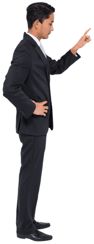 Biracial Businessman Pointing in Black Suit on Transparent Background - Download Free Stock Videos Pikwizard.com